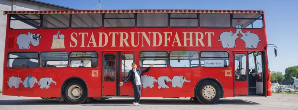 Stadtrundfahrt-Bus mit Ottifanten, Pressefoto