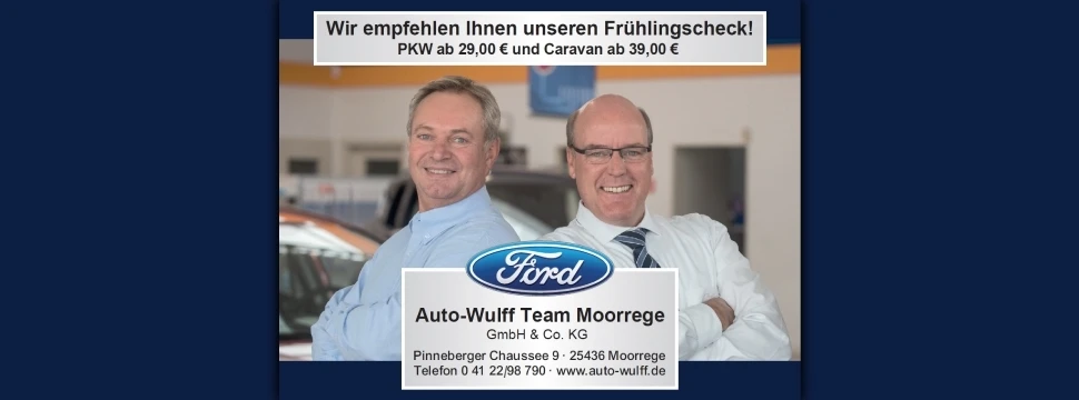 zwei Männer im Anzug gucken in die Kamera
