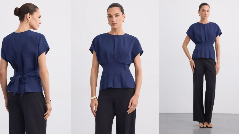 Eine Frau in einer dunklen Bluse, die in verschiedenen Positionen die Bluse für Fotos zeigt