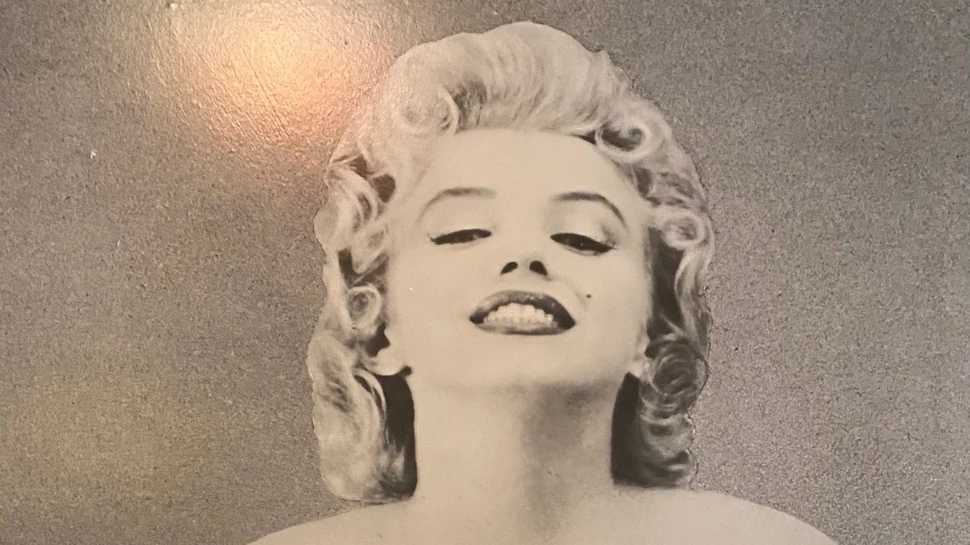 Kopf von Mailyn Monroe von einem Filmplakat