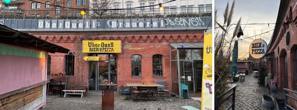 Blick auf ein Backsteingebäude mit einem großen gelben Schild vom ÜberQuell